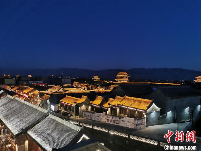 2017年，忻州启动古城保护改造项目，得益于此，这座沉睡的古城重焕光彩。图为忻州古城夜景。　高瑞峰 摄